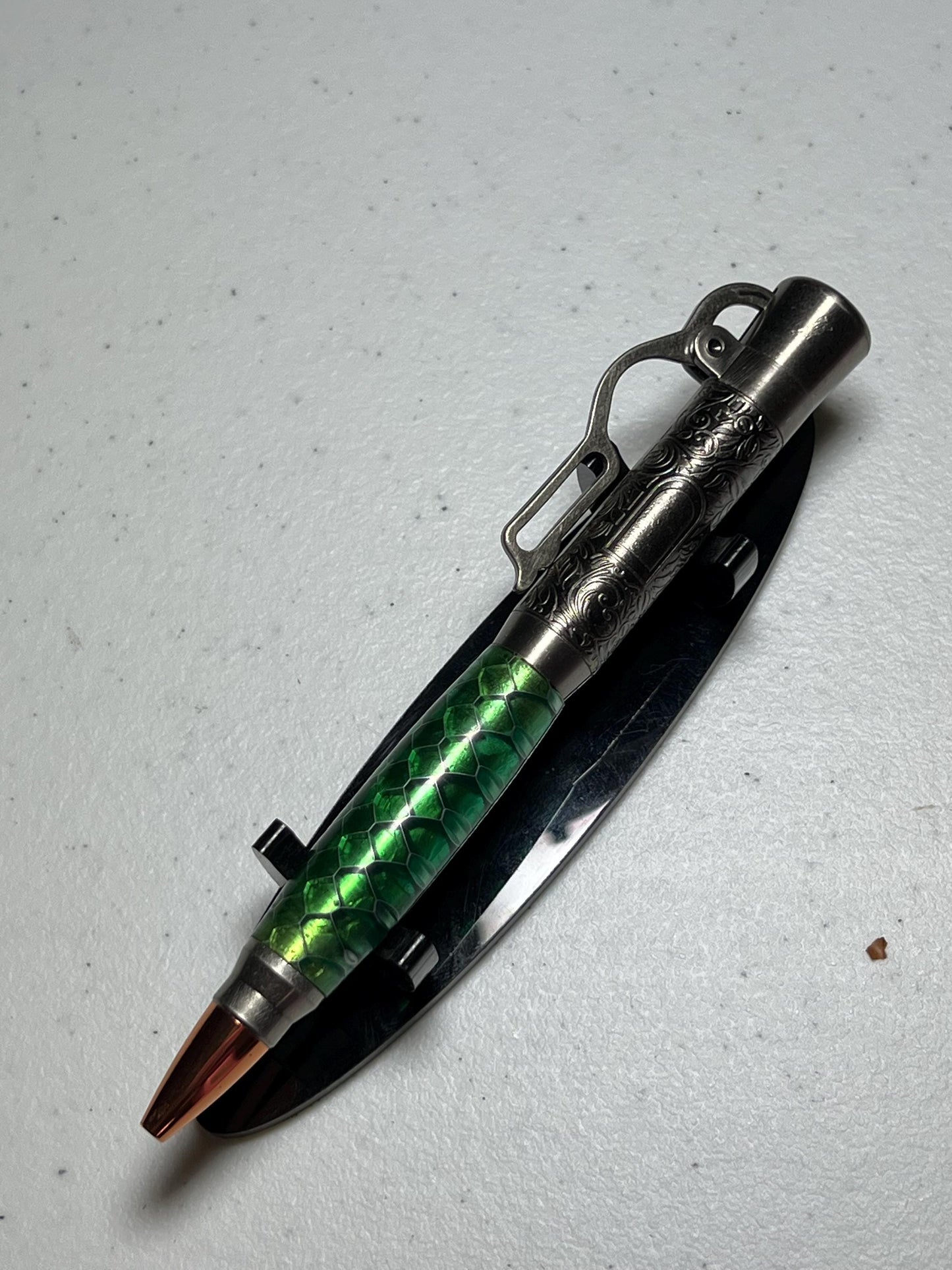 Lever action pen in antique pewter with green snake skin pattern barrel