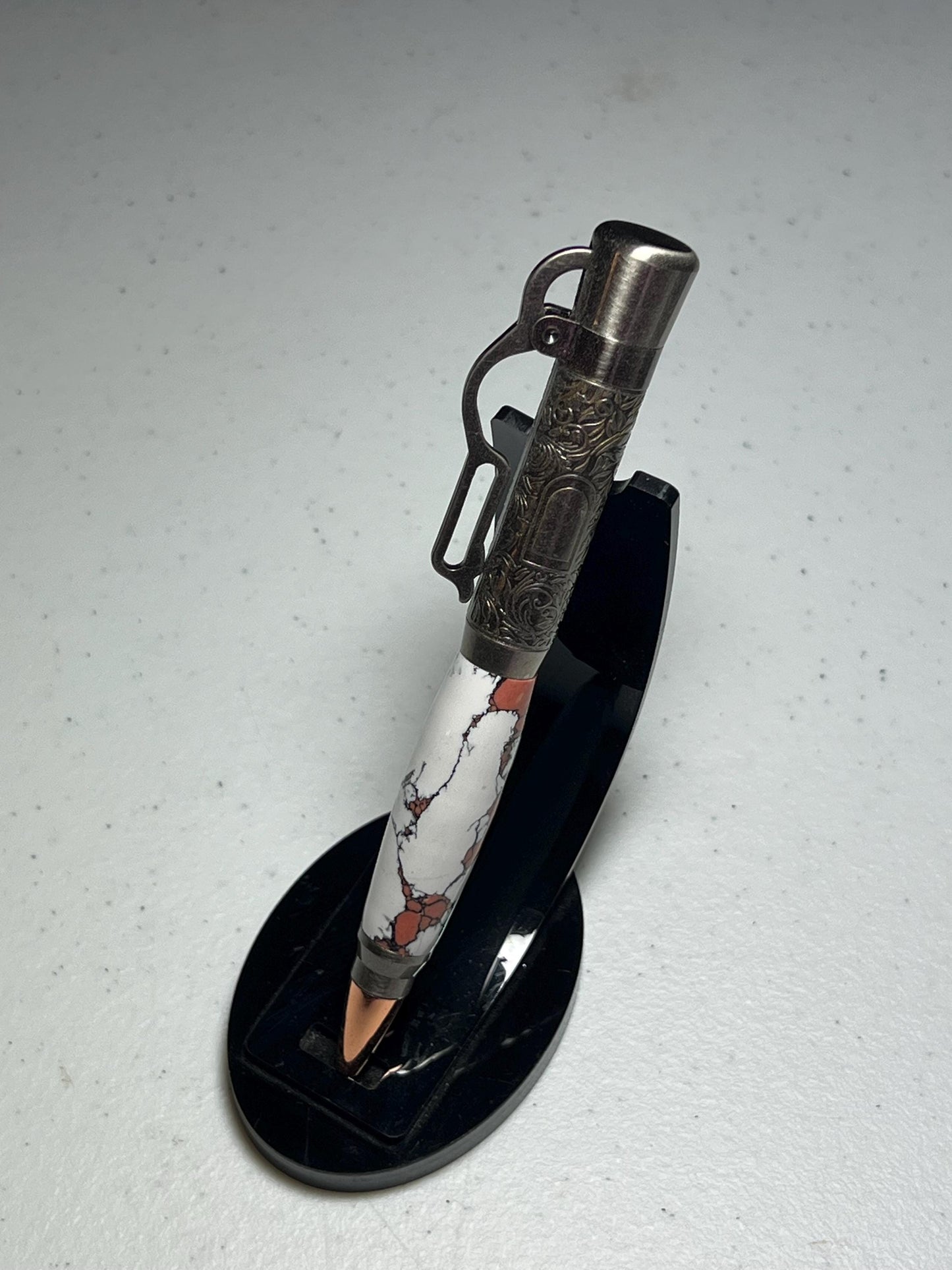 Lever action pen in antique pewter with white and peach clay barrel