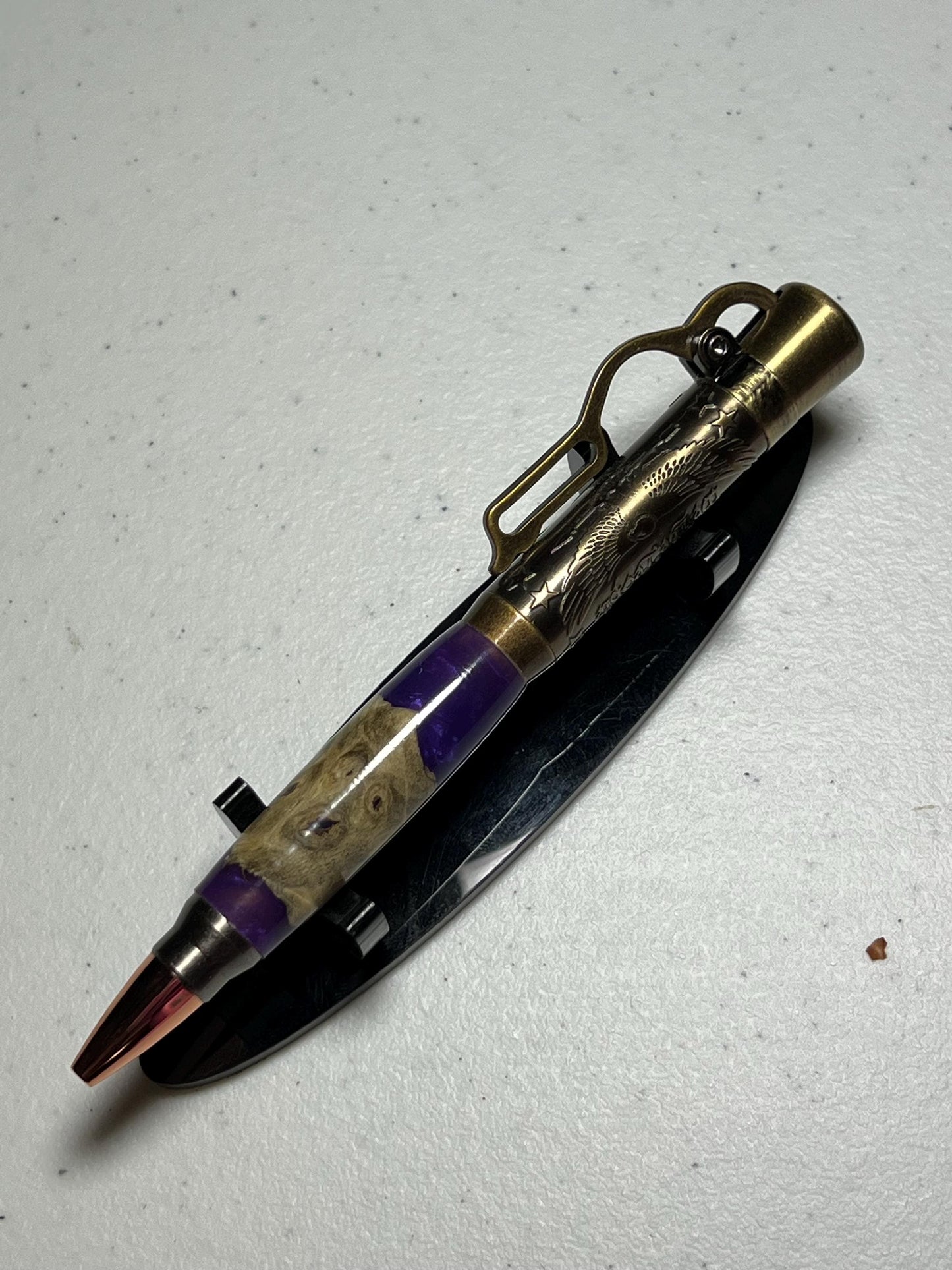 Lever action pen in antique brass with purple resin and burl barrel