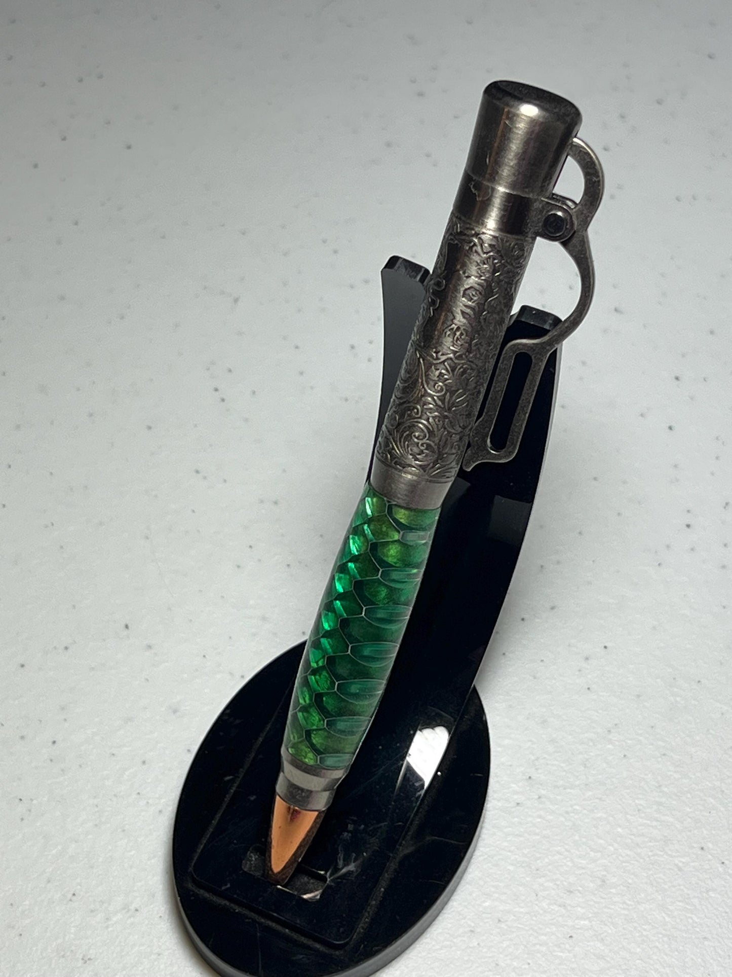 Lever action pen in antique pewter with green snake skin pattern barrel