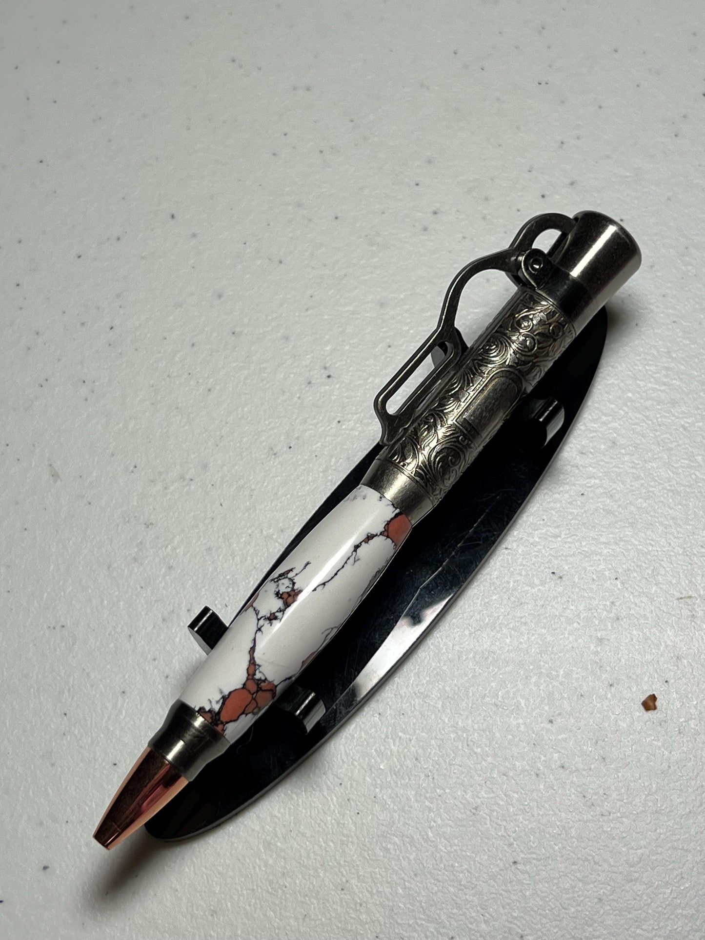 Lever action pen in antique pewter with white and peach clay barrel