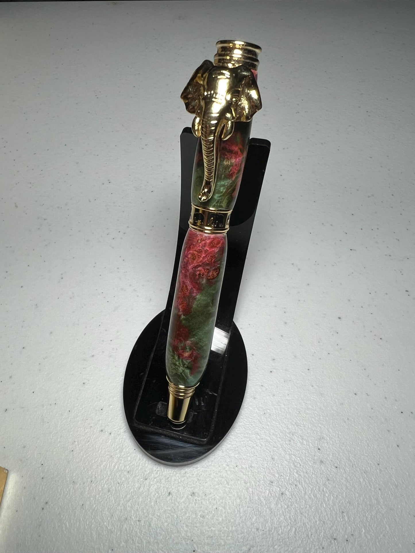 Elephant two part fountain pen in gold, with pink and green burl barrel