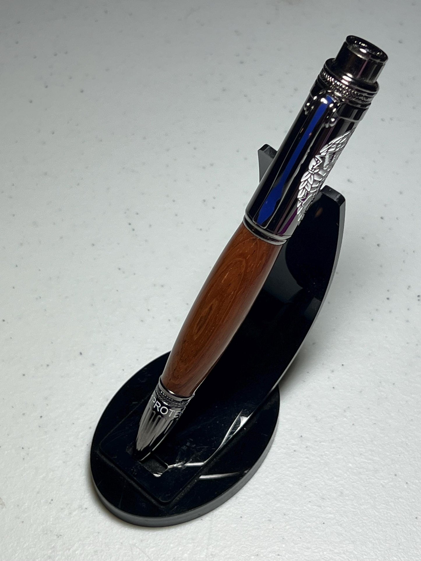 Police pen in mahogany