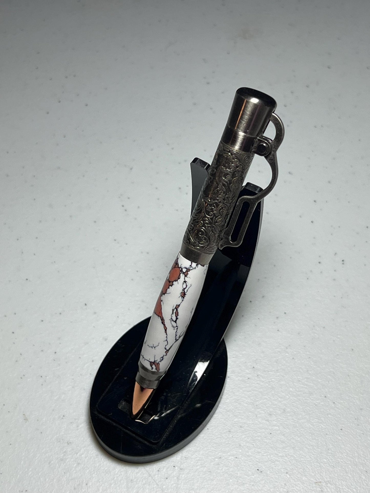 Lever action pen in antique pewter with white and peach clay barrel