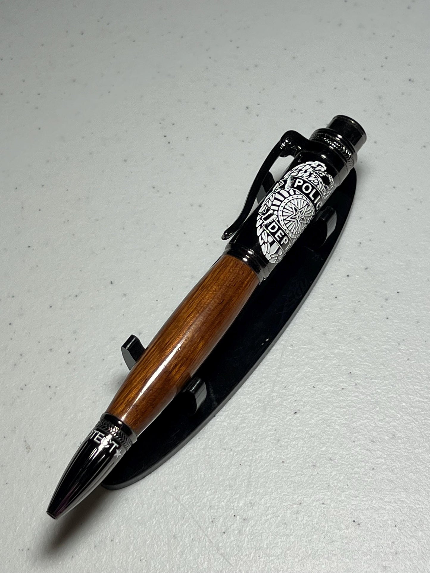Police pen in mahogany