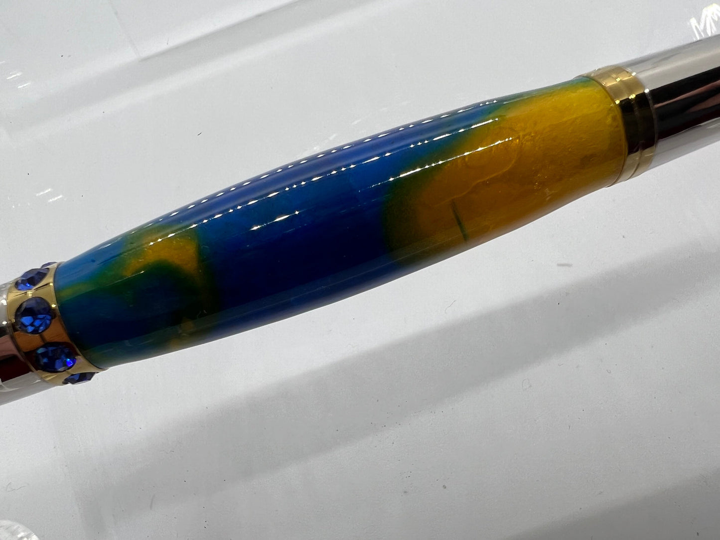 Diva pen with blue/yellow acrylic and blue Swarovski crystals.