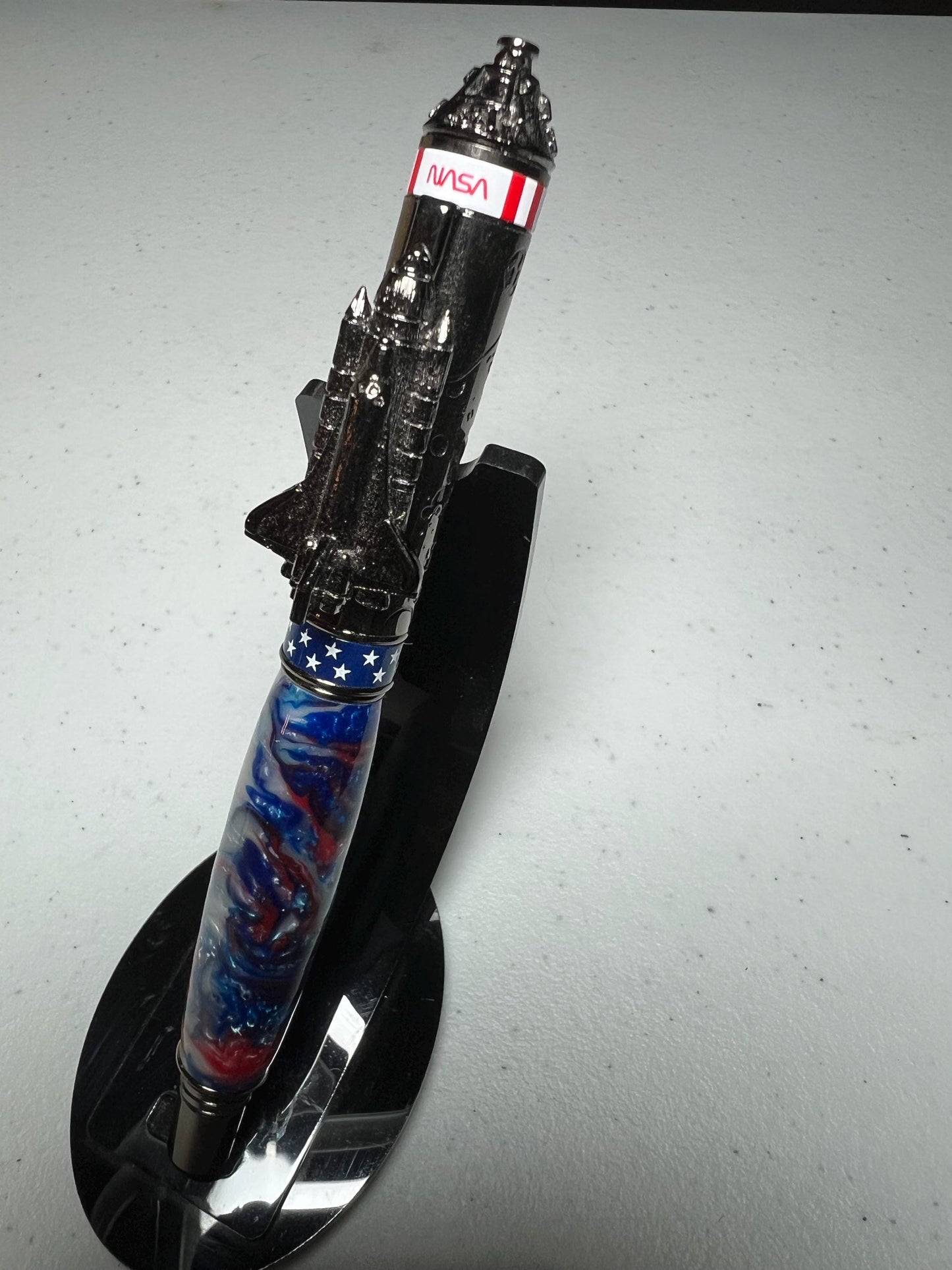 Shuttle two part fountain pen in gunmetal with red, white and blue barrel