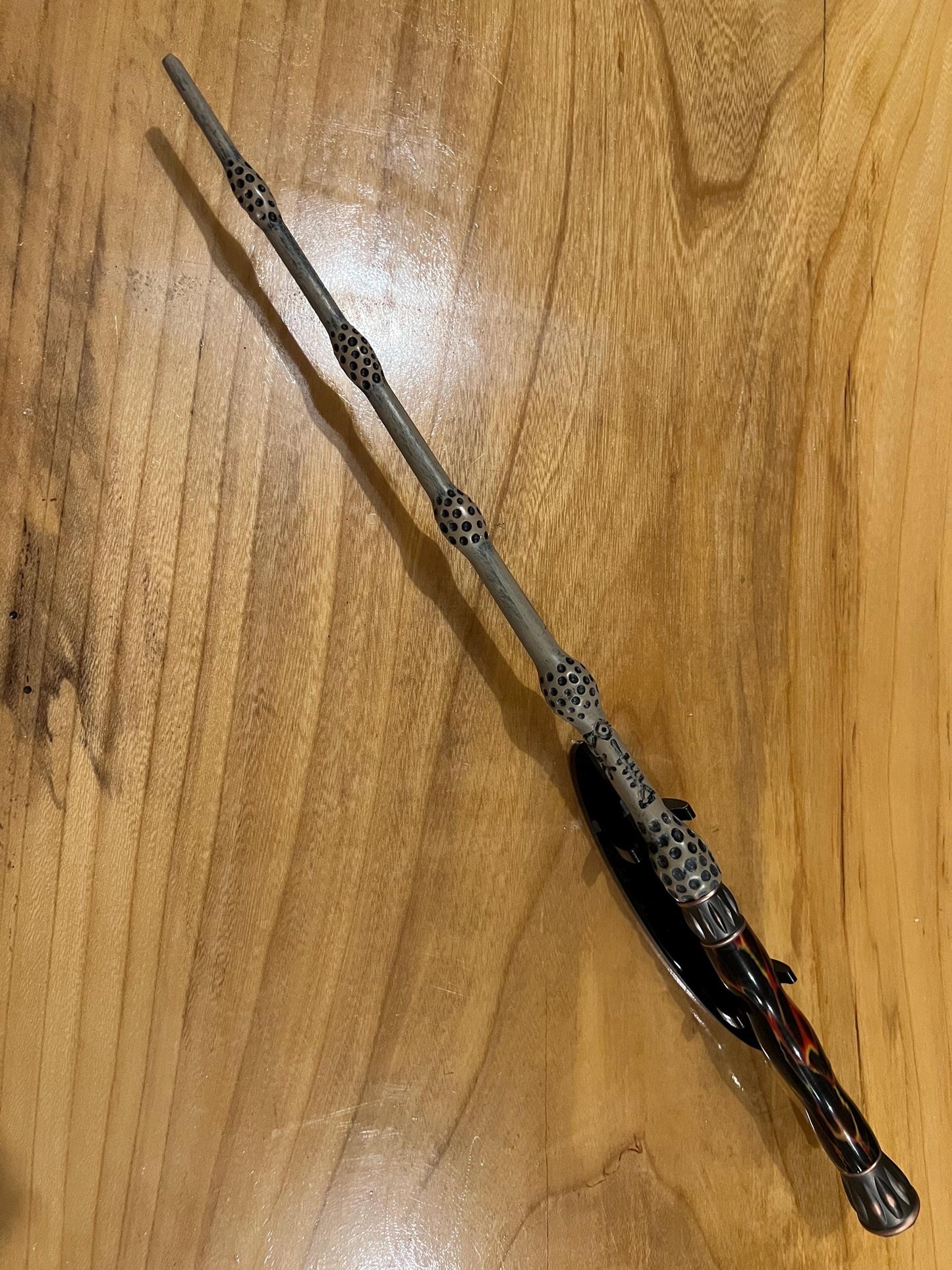 Magic wand prop with hand turned fire ember handle