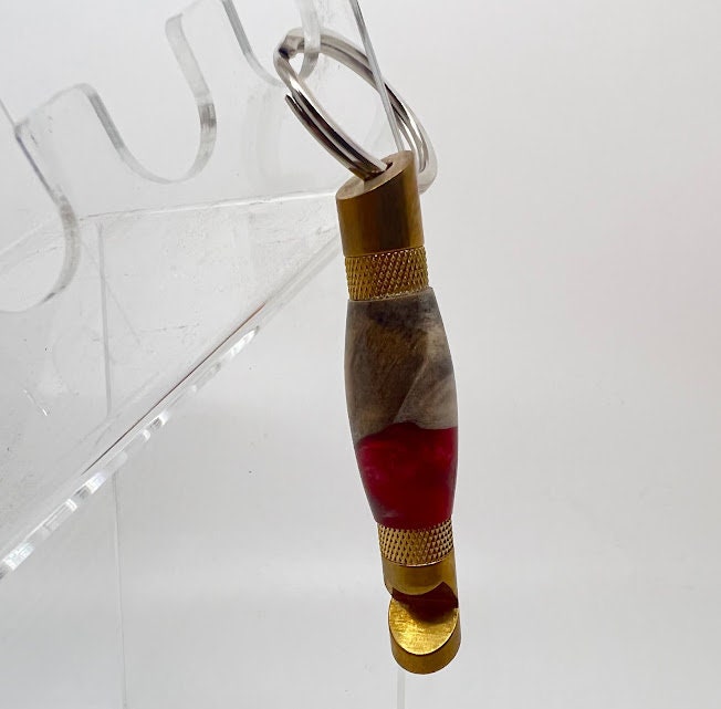 Brass bottle opener with burl and red resin