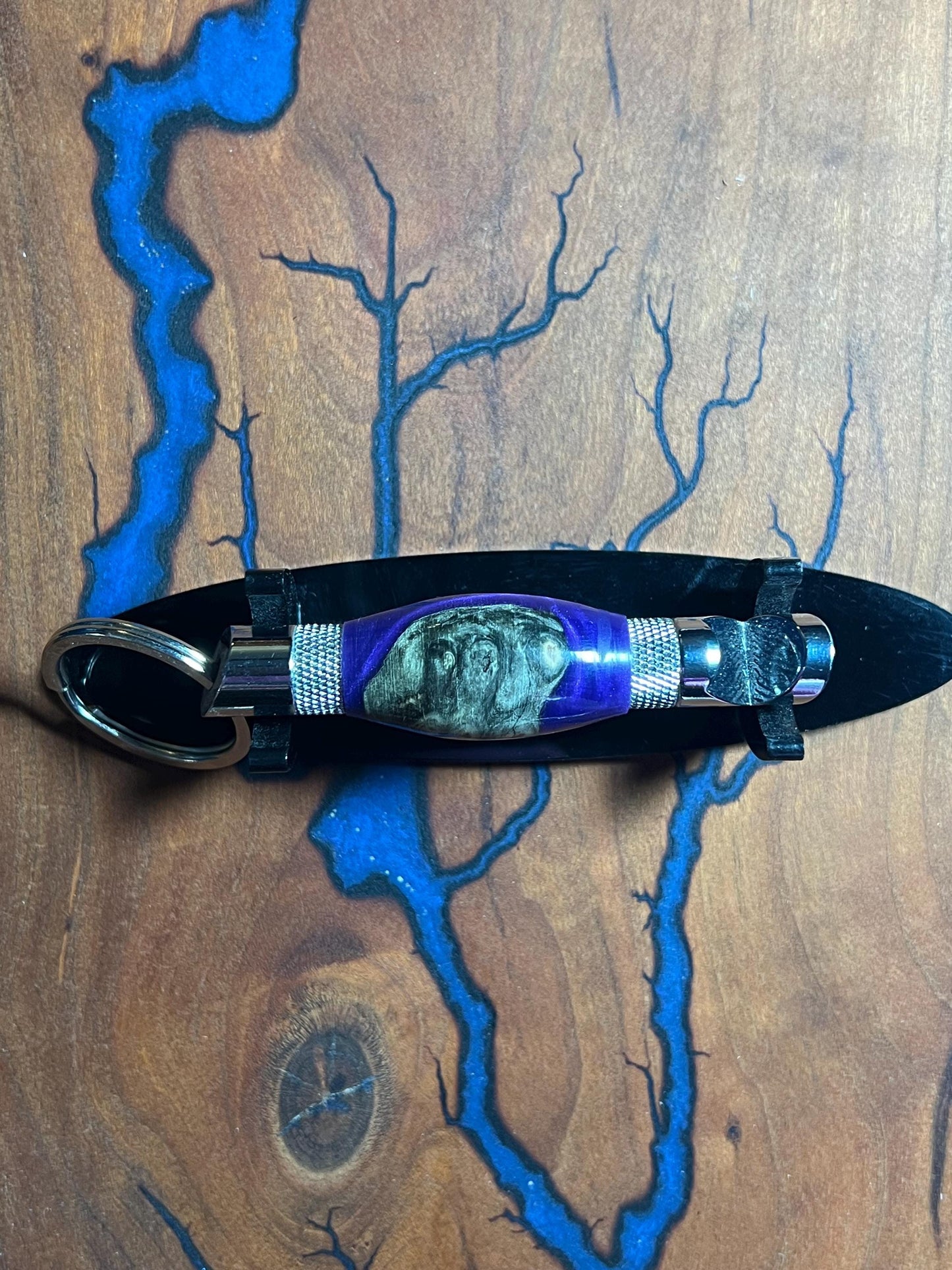 Chrome bottle opener with blue and wood resin body